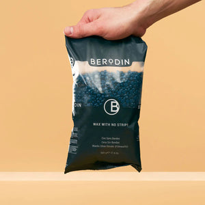 BlueHardWaxBeads500g_BlueHardWaxBeads500gHolding